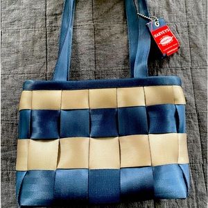 Harvey’s seatbelt bag. Gold and blue